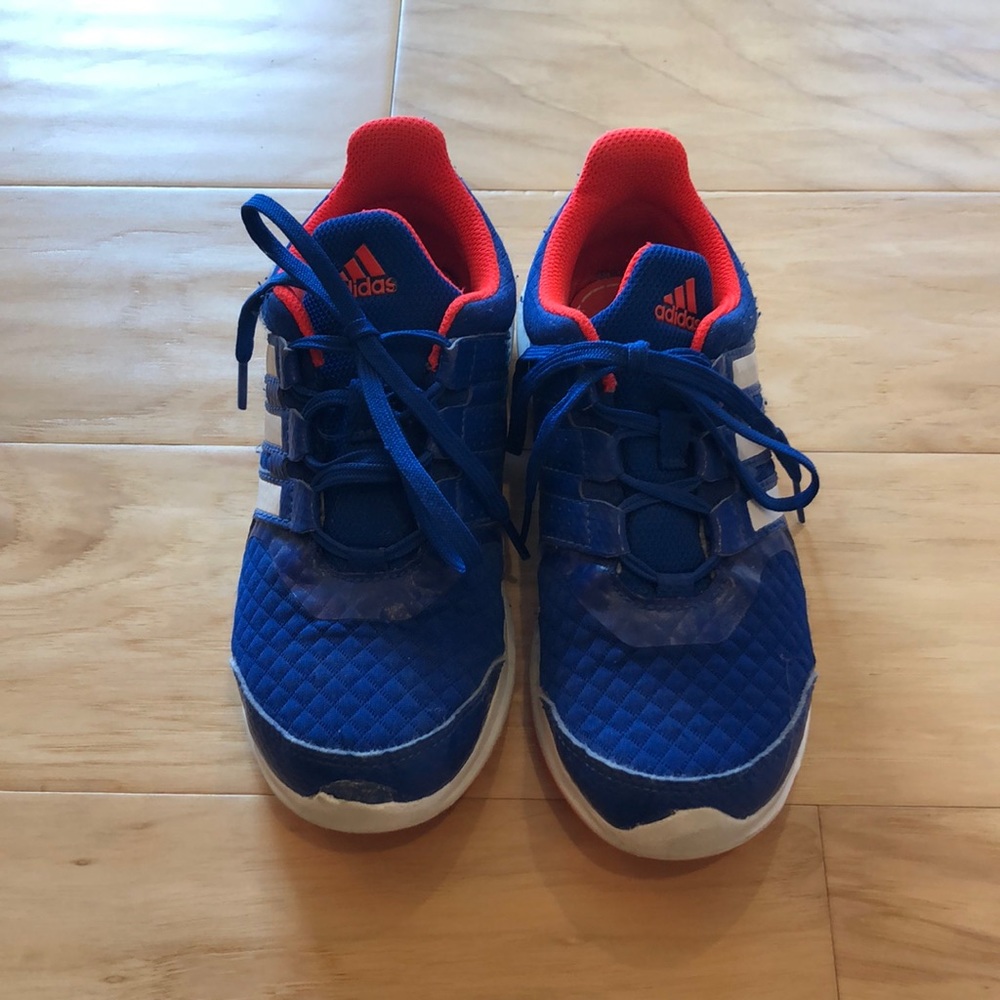 Adidas blue and neon orange kids shoe